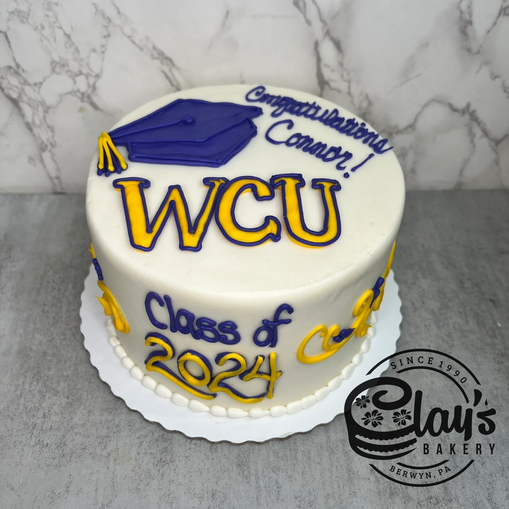 Buttercream Gradcap and Scrolls