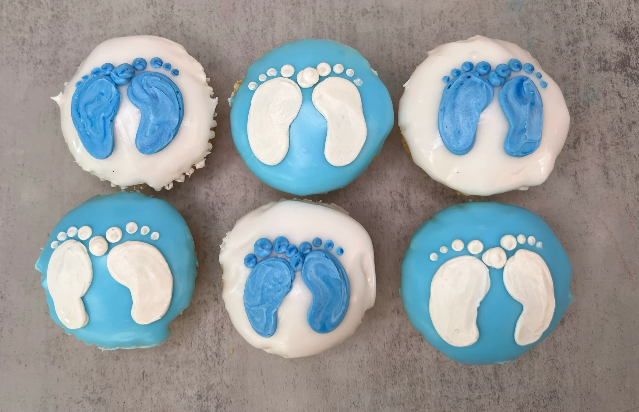 Dipped Baby Footprint Cupcakes