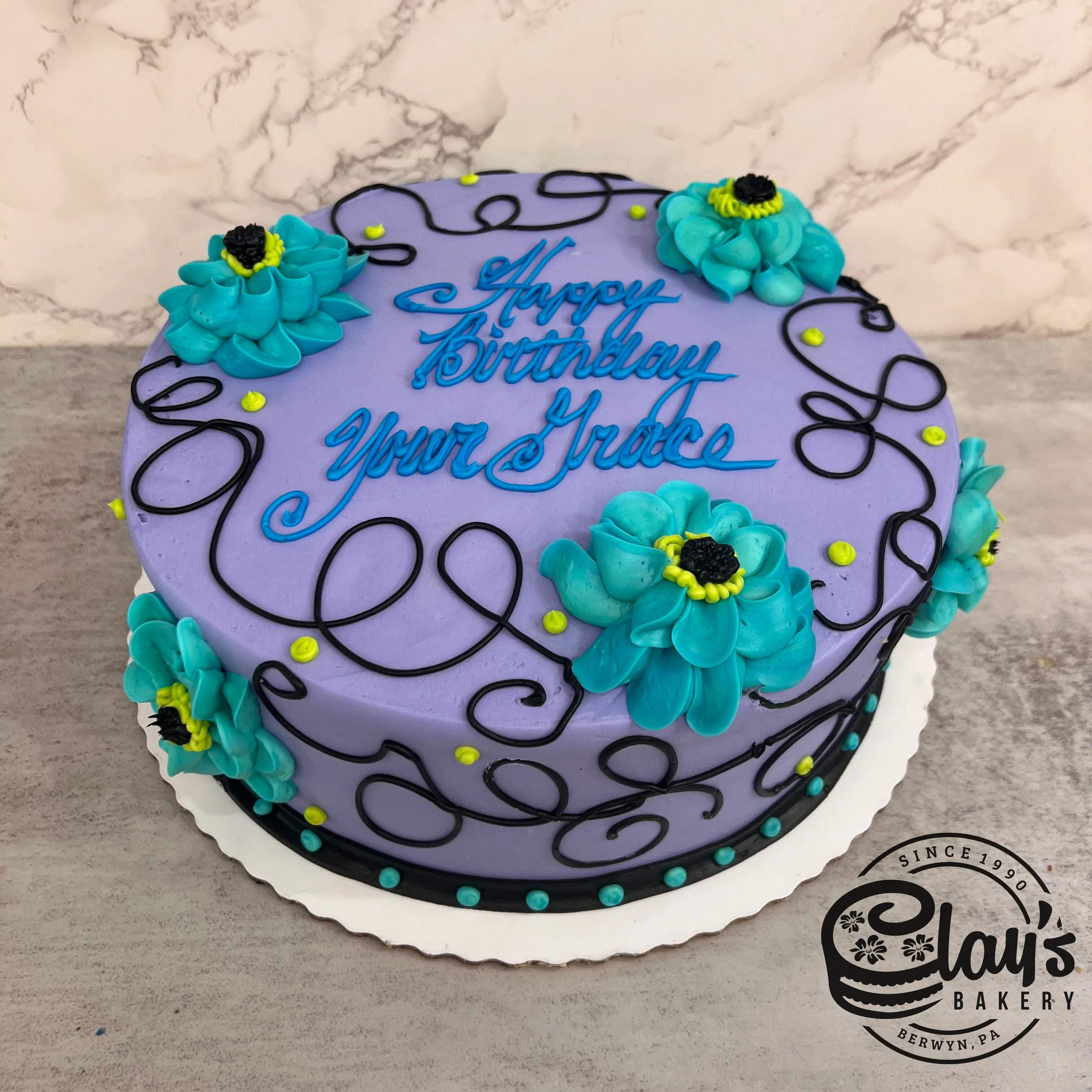 Teal Flowers with Black Accents